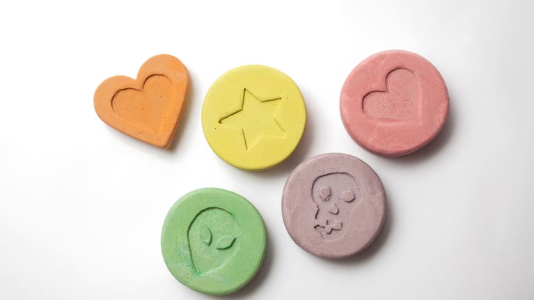 MDMA tabs on white background (file).