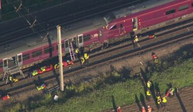 Two trains collide north of London, killing at least one person