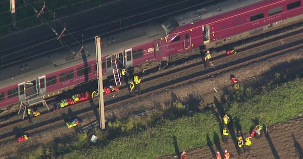 Two trains collide north of London, killing at least one person