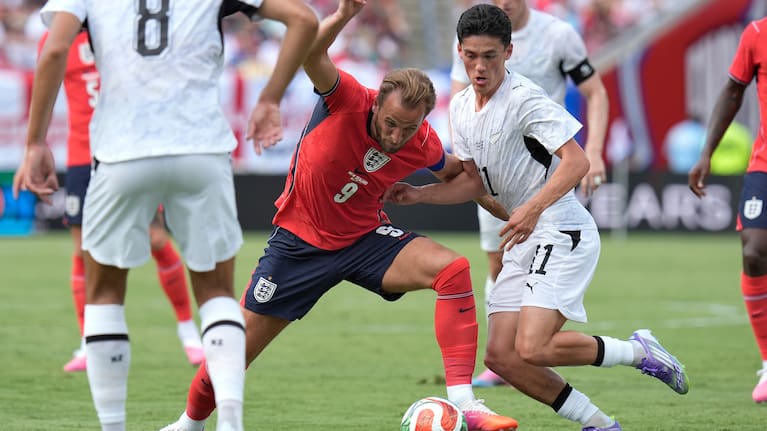 England forward Harry Kane (9) moves the ball in front of New Zealand forward Elijah Just (11) during the first half of an international friendly soccer match