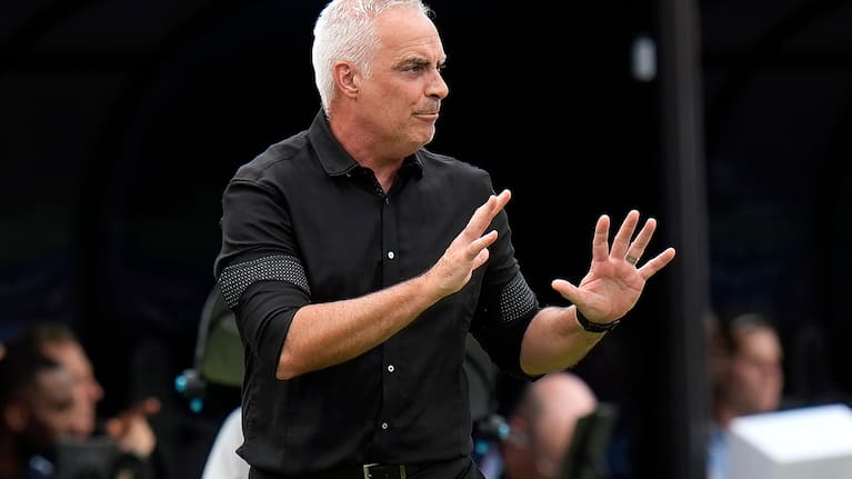 New Zealand's Darren Bazeley calls a play against England during the second half of an international friendly soccer match