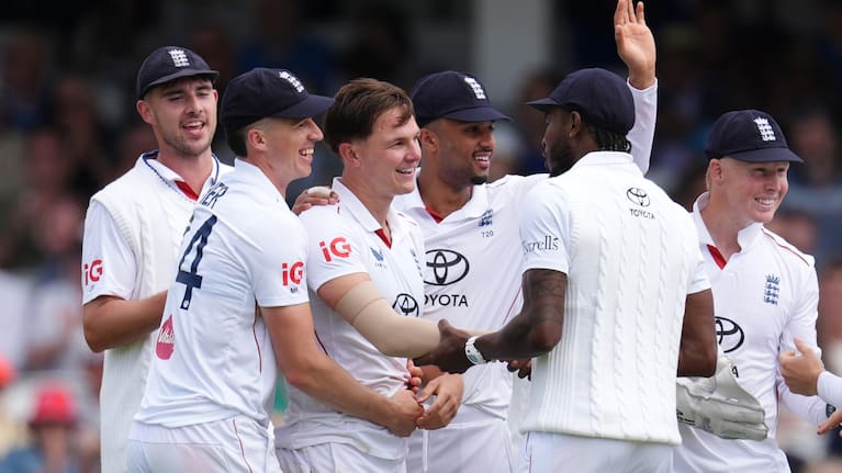 England's Sonny Baker, third left, celebrates taking the wicket of New Zealand's Rachin Ravindra on day one of the second cricket test between England and New Zealand in London.