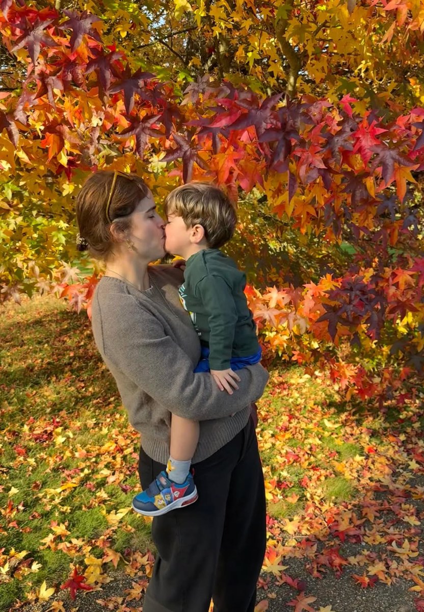 Princess Eugenie shares a sweet embrace with son Ernest in a tender autumn moment.