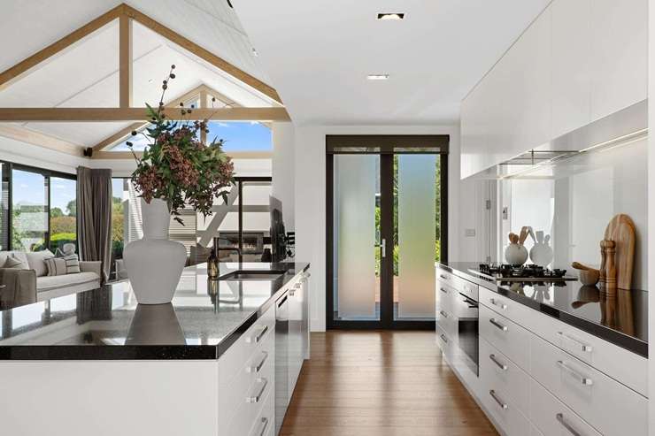 A four-bedroom home on East Stream Lane, in Clearwater, Northwood, fetched $2.455m at auction. Photo / Supplied