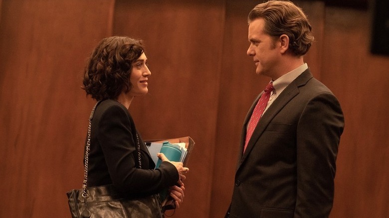 Alex Forrest (Lizzy Caplan) speaks to Dan Gallagher (Joshua Jackson) in Fatal Attraction
