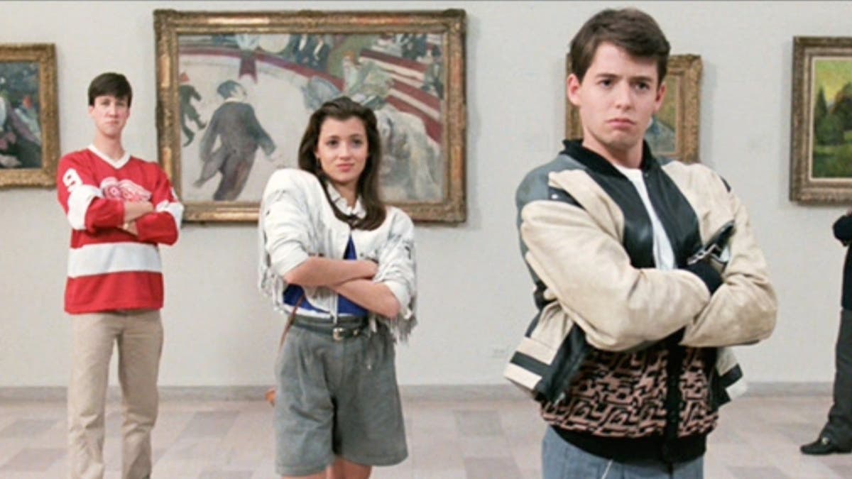 Alan Ruck as Cameron Frye, Mia Sara as Sloane Peterson, and Matthew Broderick as Ferris Bueller standing inside the Art Institute of Chicago.