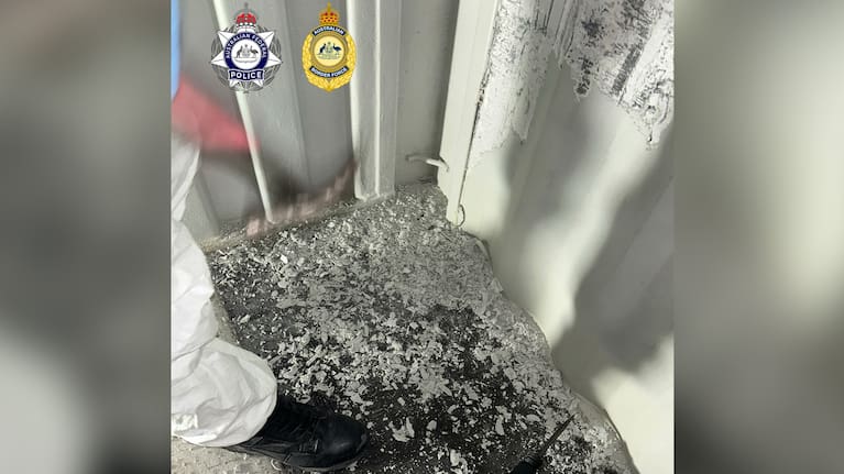 Flakes of methamphetamine that had been infused into the wall of a container. (Source: Australian Federal Police / Australian Border Force)