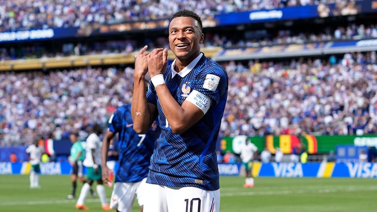 France's Kylian Mbappe celebrates after scoring the opening goal of his team during the World Cup Group I match between France and Senegal