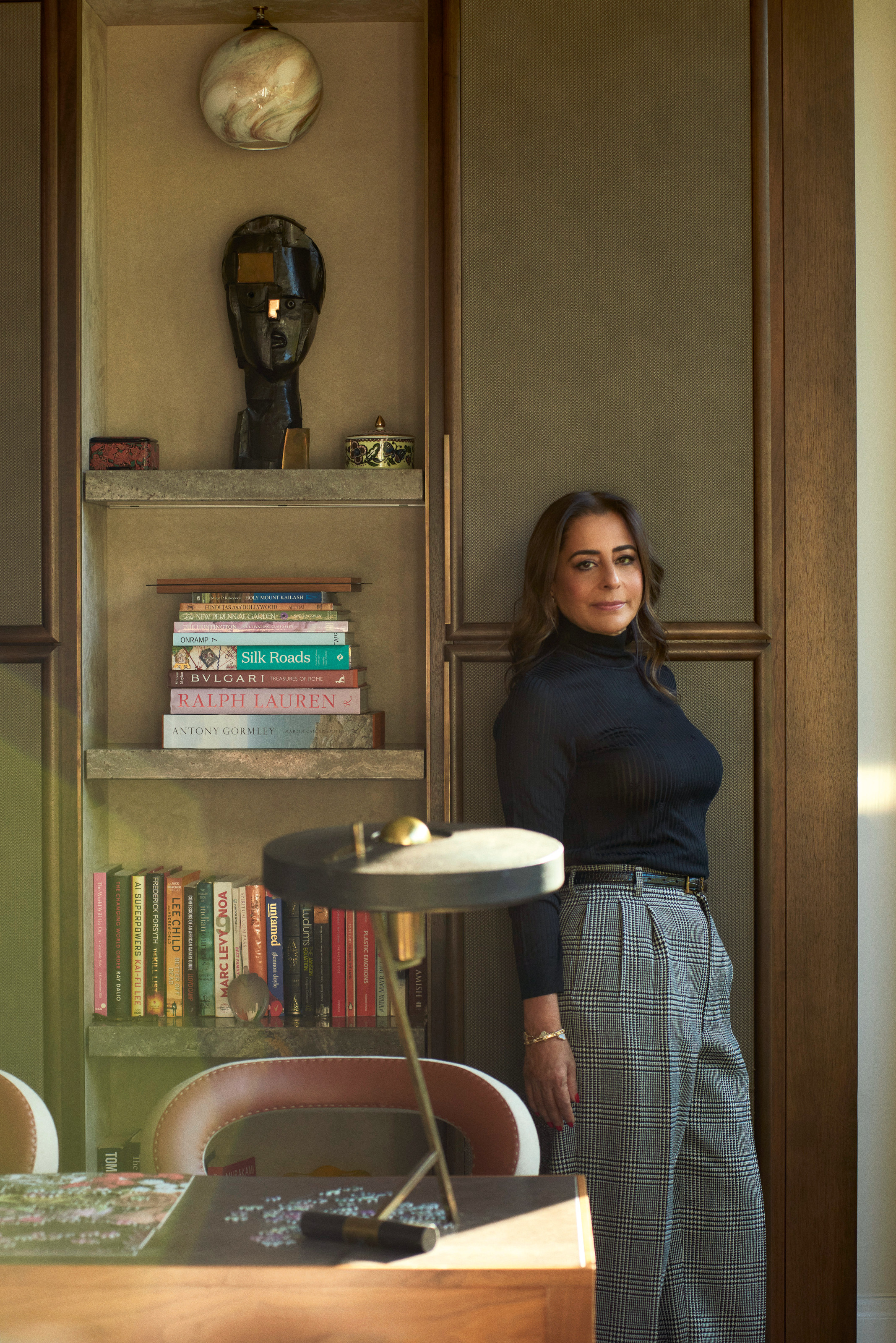 Portrait of Shalini Misra in a green study