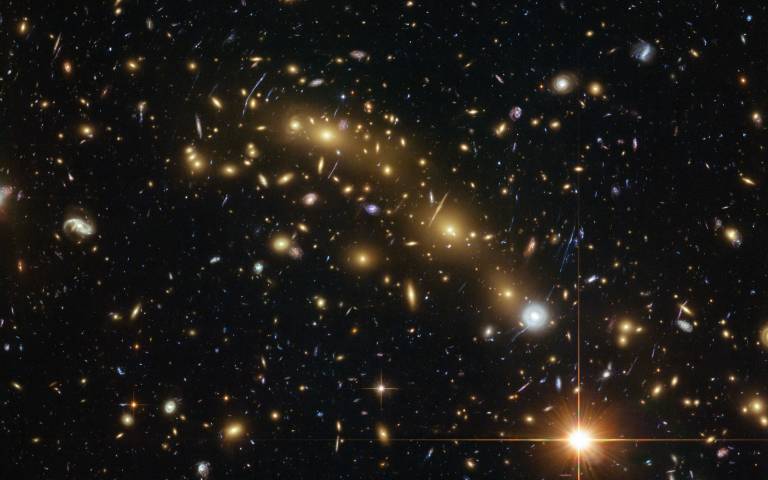 Some of the earliest galaxies that cosmologists have yet to detect. Credit: ESA/Hubble, NASA, HST Frontier Fields.