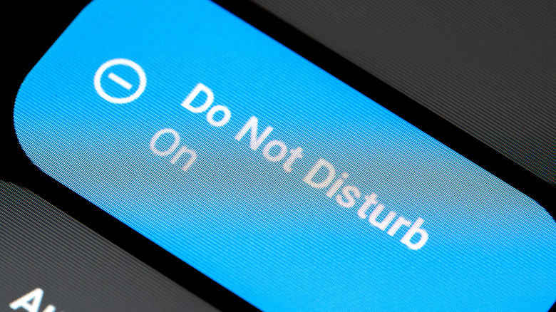 Close-up of a smartphone screen in do not disturb mode