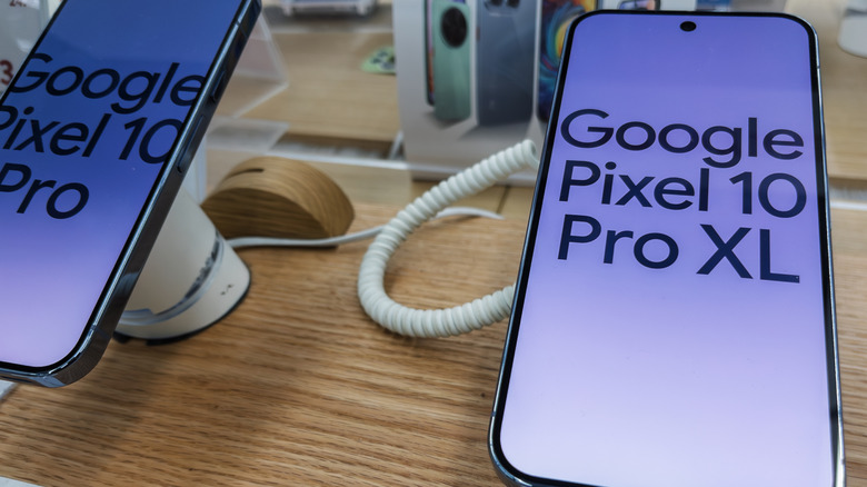 Google Pixel 10 Pro and 10 Pro XL smartphones in a retail store