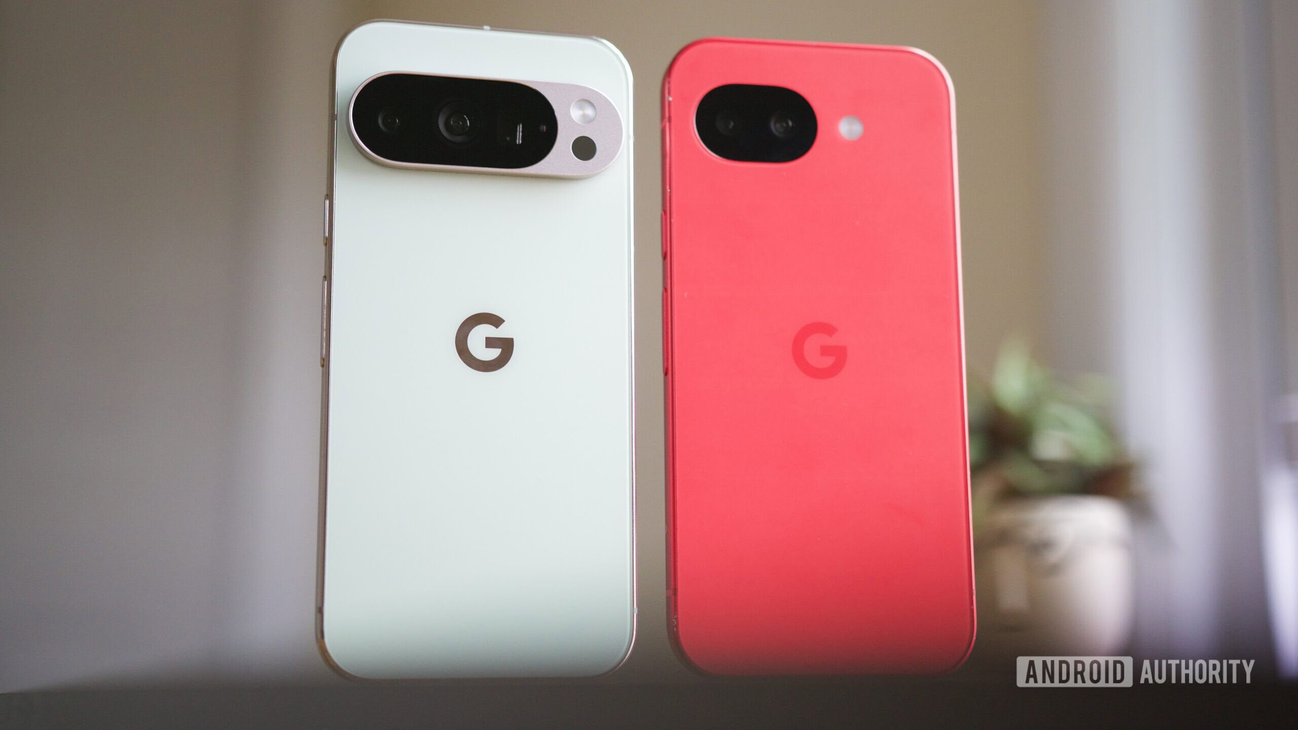 Google Pixel 10 Pro and Pixel 10a standing next to each other.