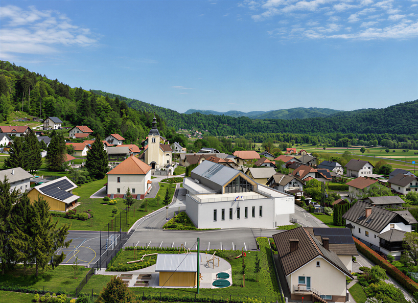 concrete and beech shape flexible learning spaces within school and social hub in slovenia - 1