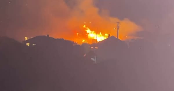 Porirua house fire spreads to neighbouring property amid high winds