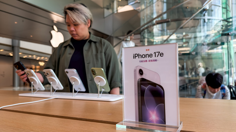 Person shopping for a phone in a retail store