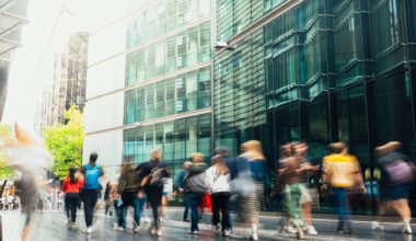 People walking in blurred motion in a modern downtown street