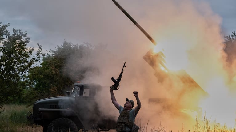 In this photo provided by Ukraine's 93rd Kholodnyi Yar Separate Mechanized Brigade press service, a soldier reacts as an MRLS BM-21 "Grad" fires at the Russian positions near Kostiantynivka, Donetsk region, Ukraine, Thursday, June 4, 2026.