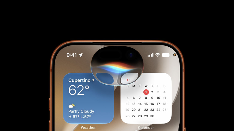 Photo zoomed in on the upper half of an iPhone running iOS 27 with the Siri icon open