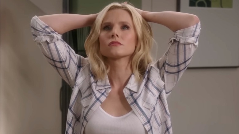 Eleanor Shellstrop looking shocked with hands on head