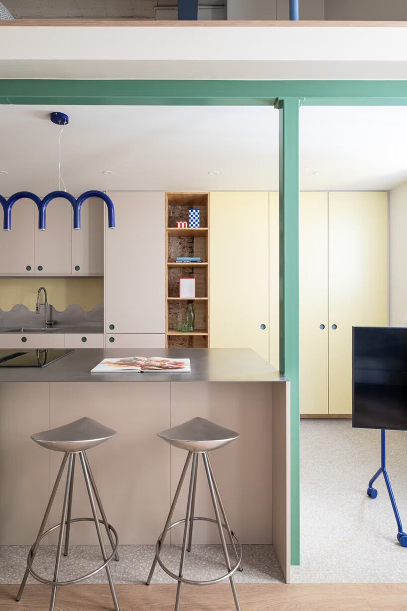 NOT A STUDIO uses color-coded structure to open up century-old barcelona apartment - 4