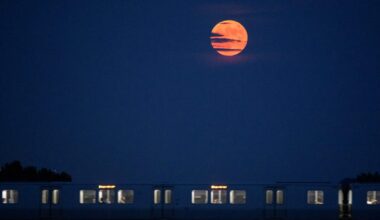A photo of a full moon over the Potomac River in Washington.