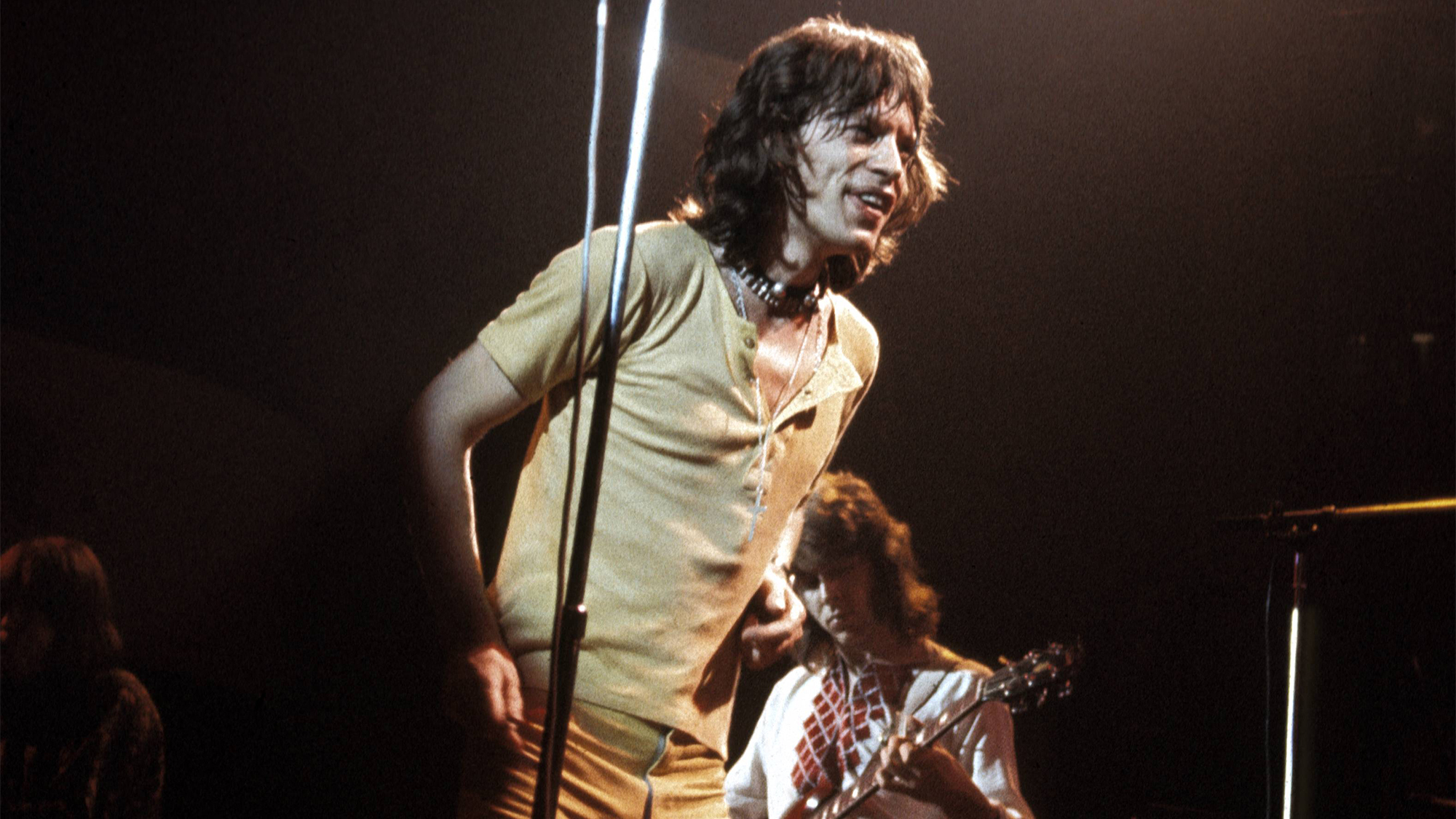 From left, Mick Jagger and Mick Taylor of The Rolling Stones perform live on stage at Colston Hall in Bristol, England during the band's Tour of the United Kingdom 1971, on 9th March 1971.