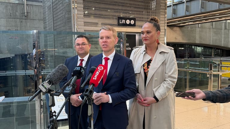 Labour leader Chris Hipkins speaks alongside spokesperson for transport Tangi Utikere and spokesperson for Auckland Carmel Sepuloni.
