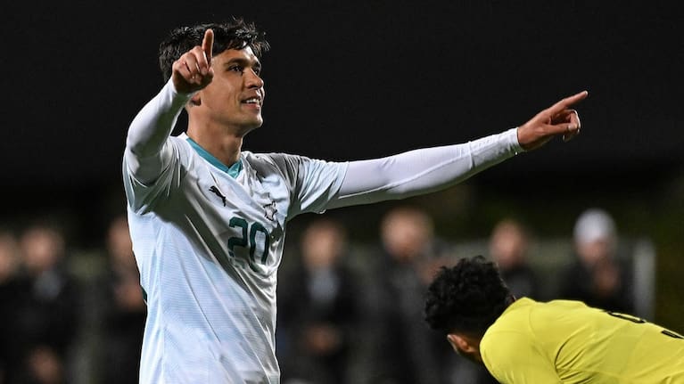 Logan Rogerson celebrates a goal against Malaysia.