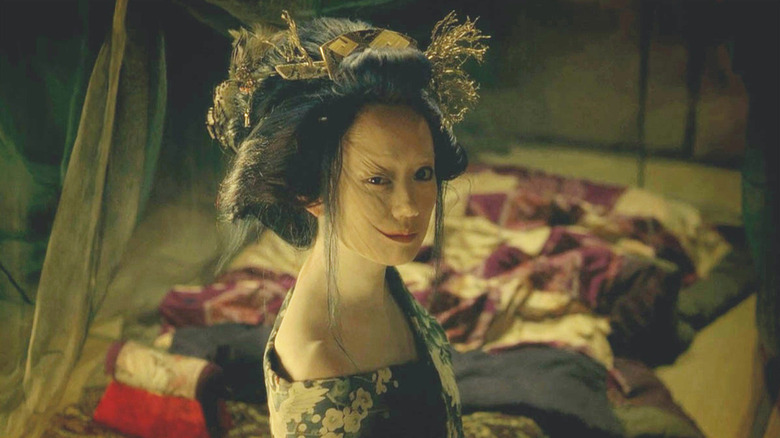 Komomo (Michie Itô) stands slightly disfigured in Masters of Horror