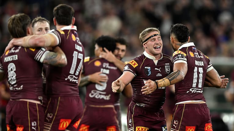 Max Plath and Briton Nikora of the Maroons celebrate their win during State of Origin Game 2 between the NSW Blues and the Queensland Maroons.