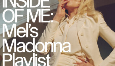 Madonna smoking a cigarette in a white pantsuit with the words "INSIDE OF ME: Mel
