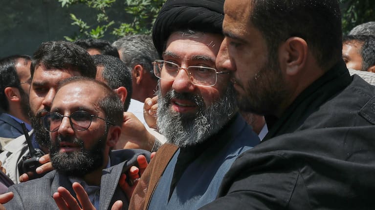 Mojtaba Khamenei, the son of Iran's Supreme Leader, Ayatollah Ali Khamenei, center, attends the annual Quds, or Jerusalem Day, rally in Tehran, Iran, May 31, 2019.