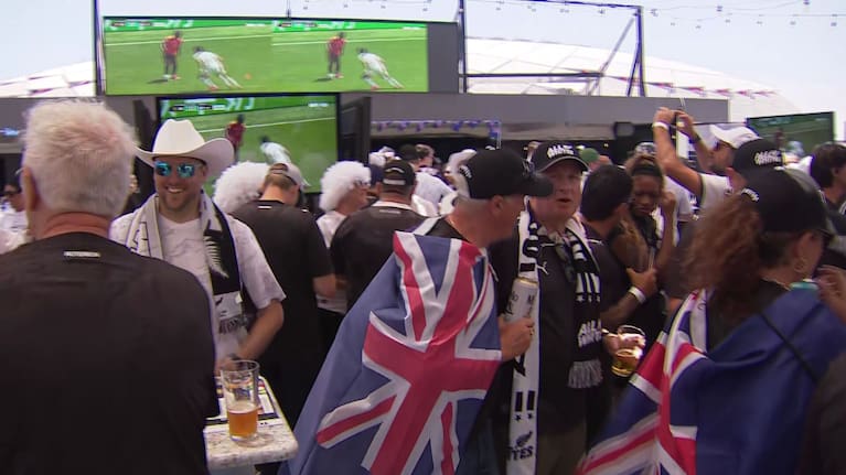 New Zealand fans at a rooftop party ahead of New Zealand's FIFA World Cup tie with Iran.