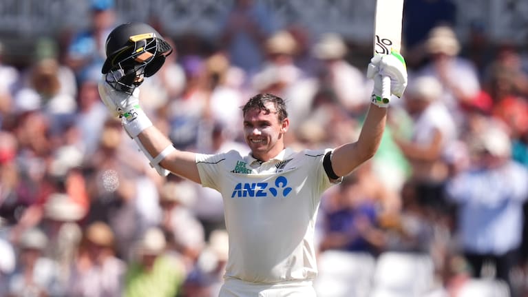 New Zealand's Tom Latham celebrates reaching a century, during day one of the Third Test cricket match between England and New Zealand, in Nottingham, England.