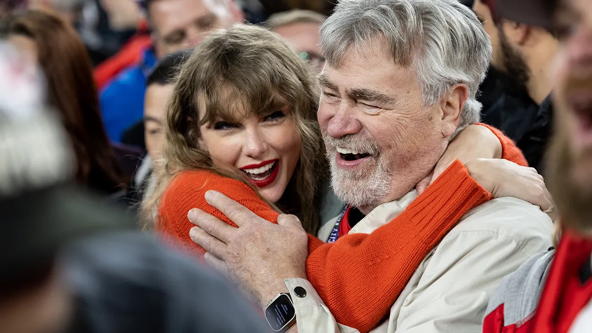 Taylor Swift hugging Ed Kelce at M&T Bank Stadium in Baltimore