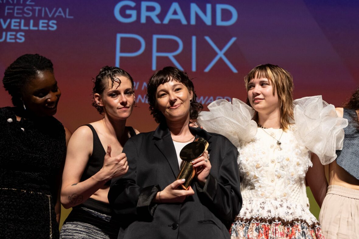 Kristen Stewart poses onstage with Paloma Schneideman at the 4th Nouvelles Vagues International Biarritz Film Festival closing ceremony after Big Girls Don’t Cry won the Grand Prix.