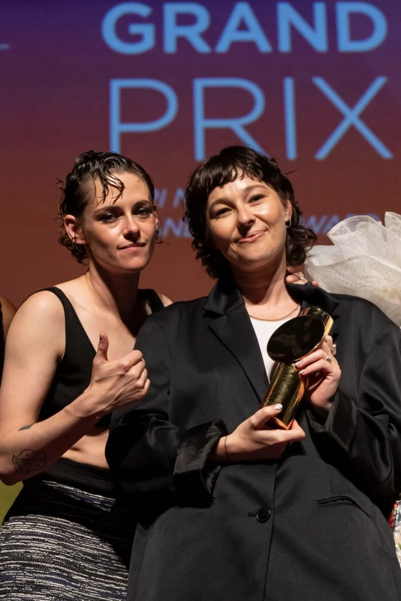 Kristen Stewart poses onstage with Paloma Schneideman at the 4th Nouvelles Vagues International Biarritz Film Festival closing ceremony after Big Girls Don’t Cry won the Grand Prix.