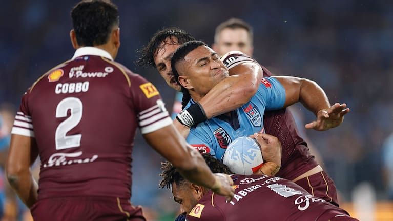 Haumole Olakau'atu of the Blues is tackled during game one of the 2026 Men's State of Origin series between New South Wales Blues and Queensland Maroons at Accor Stadium on May 27, 2026 in Sydney, Australia.