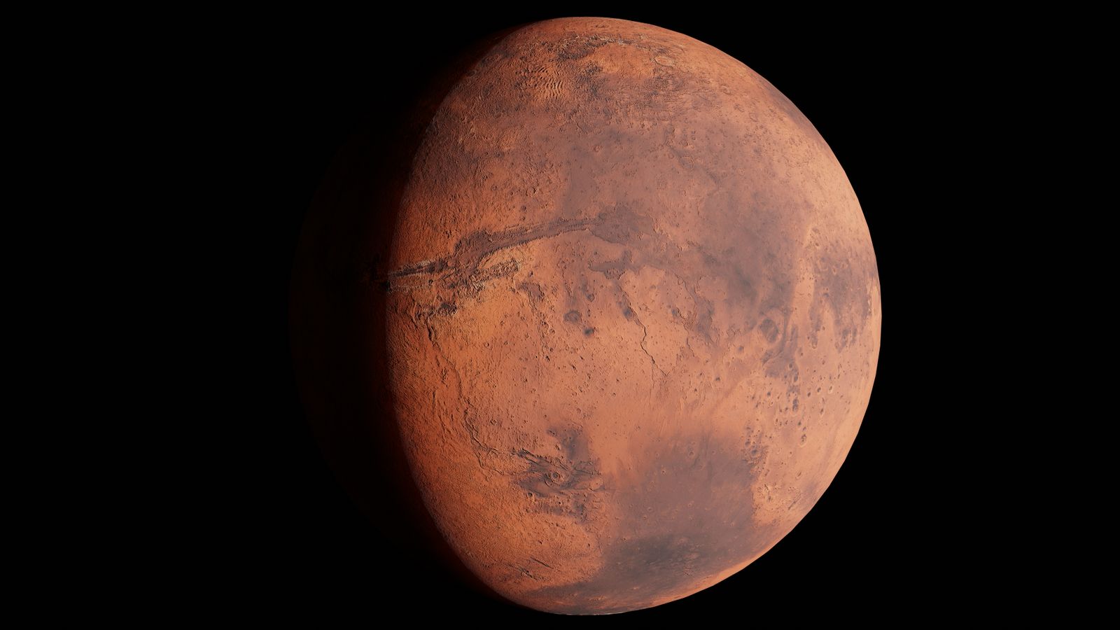 The tallest volcano in the solar system is so wide that from most places on its slopes, you would never see a dramatic summit rising ahead of you — Olympus Mons is broader than some countries, and its gentle flanks curve away with Mars long before the mountain looks like a mountain at all.