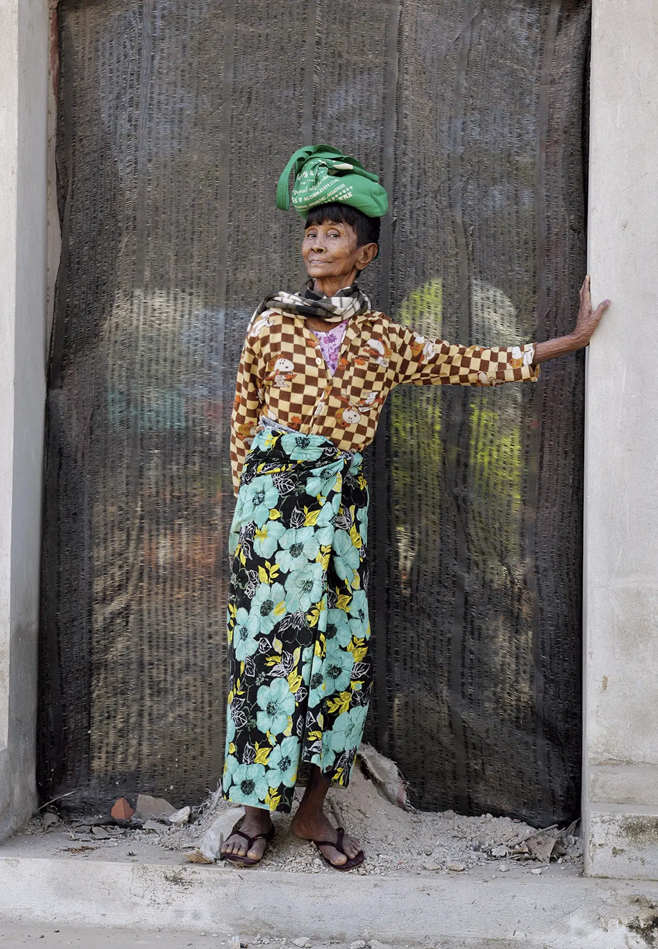 Woman leaning on wall