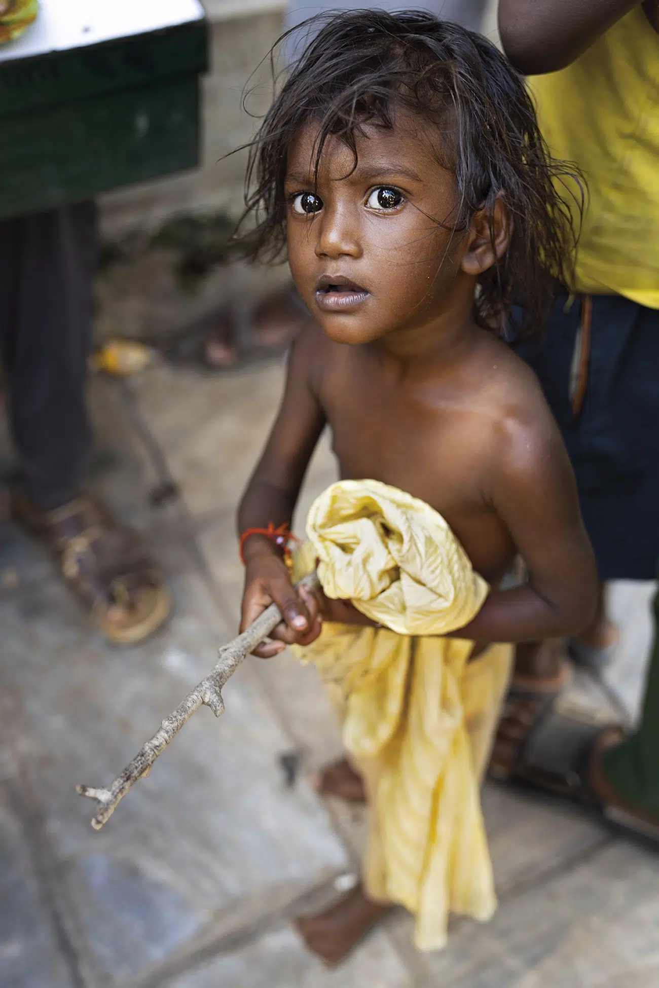 Child staring at camera.