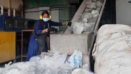 A worker feeds plastic waste into a conveyor system at a TEL Plastics factory in Habiganj, where discarded plastic is sorted and processed into recycled raw materials. The plant is part of Bangladesh’s expanding plastic circular economy, with around 1,000 enterprises recycling nearly 4 lakh tonnes of waste annually.
The photo was taken recently. Photo: Shahadat Hossain
