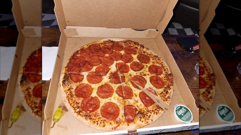 Open box of Papa Johns pizza