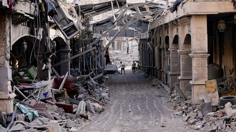People returning to their village following the announcement of an initial ceasefire agreement between the United States and Iran.