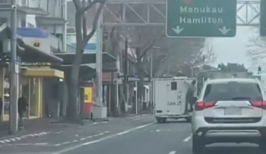 Person seen clinging to back of prison van in central Auckland