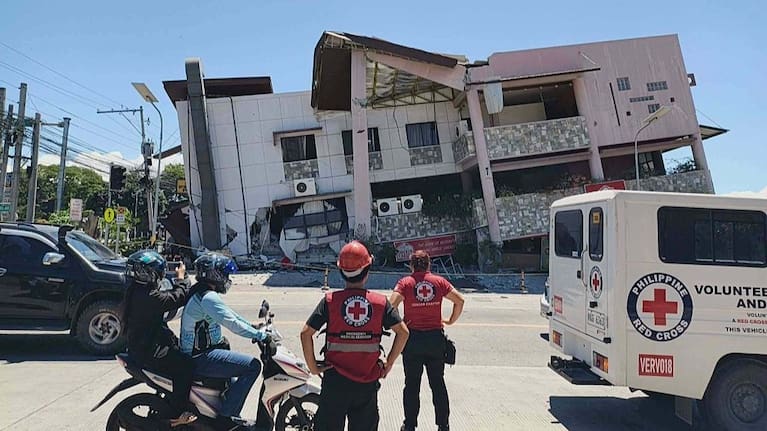 Philippine Red Cross personnel assess a damaged building following a magnitude 8.2 earthquake in Mindanao, Philippines, on June 8, 2026.