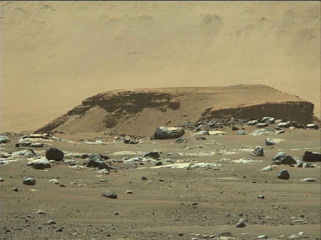 A landscape photo from Mars, showing a remnant of a fan-shaped deposit of sediments known as a delta
