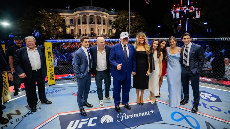 President Donald Trump, first lady Melania Trump, UFC President and CEO Dana White and other guests pose inside the octagon after UFC Freedom 250 on the South Lawn of the White House, Monday, June 15, 2026, in Washington.