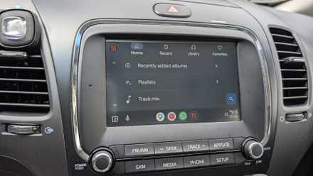 Symfonium open on the head unit of a 2018 Kia Forte. 